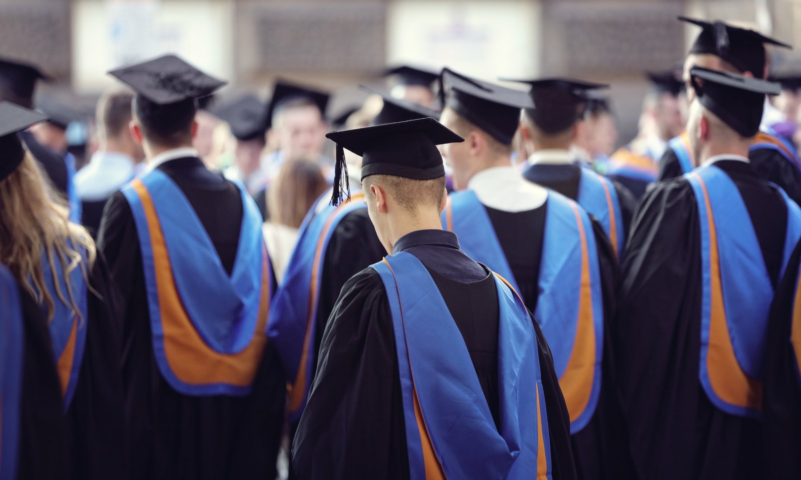 University graduates at graduation ceremony